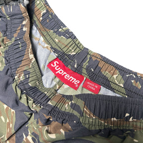 SUPREME WOVEN TRACK BOTTOMS