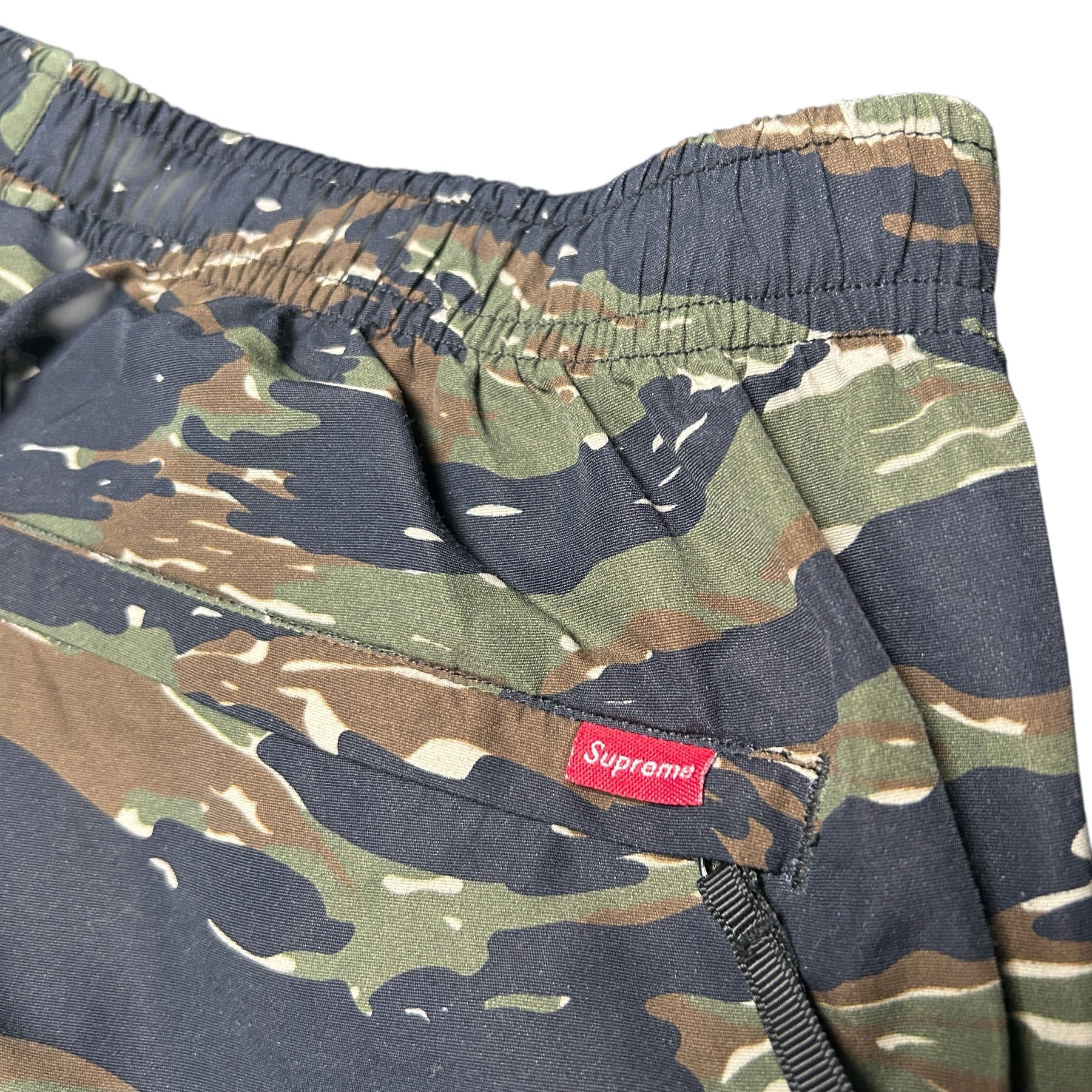 SUPREME WOVEN TRACK BOTTOMS