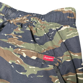 SUPREME WOVEN TRACK BOTTOMS