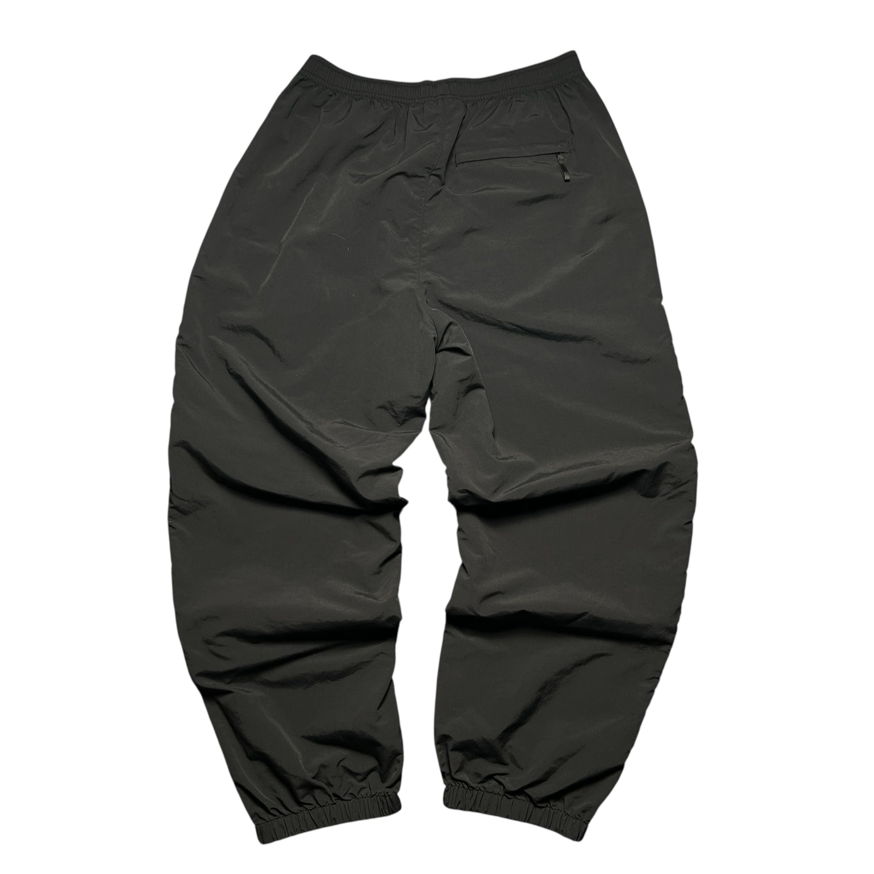 SUPREME WOVEN TRACK BOTTOMS