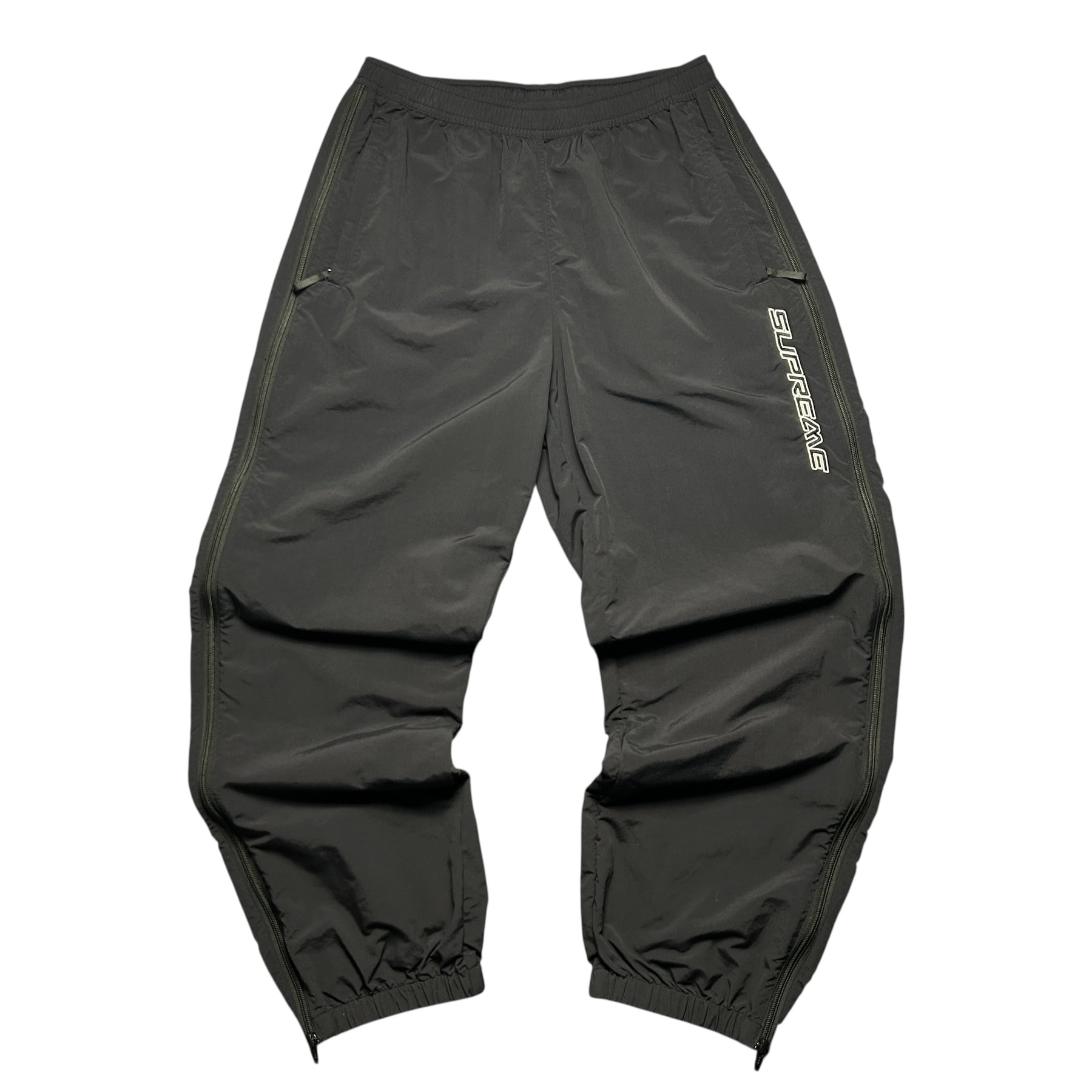 SUPREME WOVEN TRACK BOTTOMS