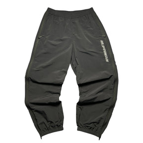 SUPREME WOVEN TRACK BOTTOMS