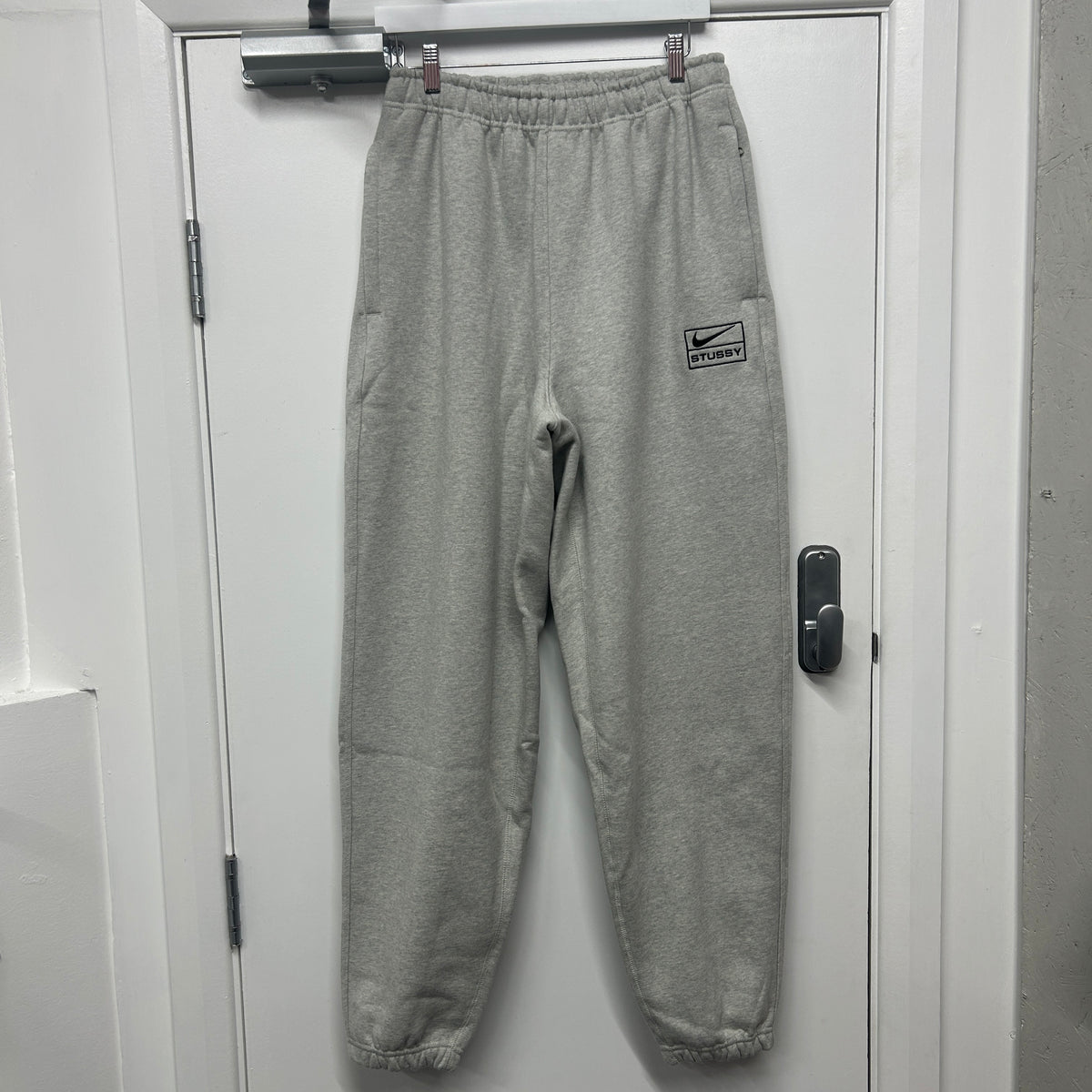 STUSSY x NIKE JOGGERS - GREY
