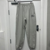 STUSSY x NIKE JOGGERS - GREY