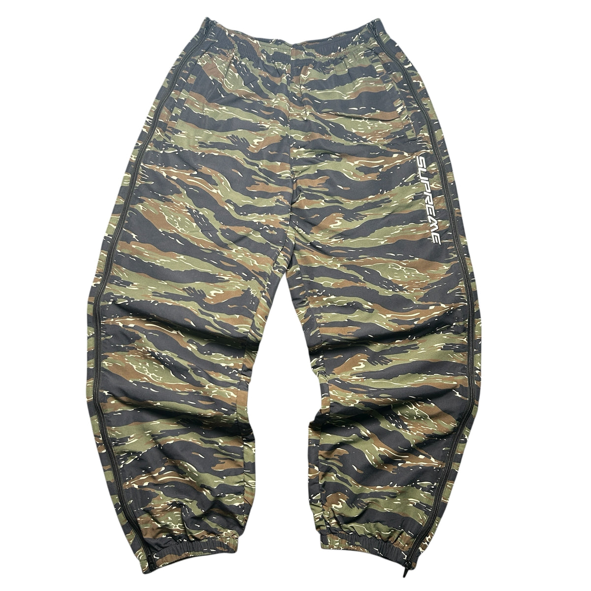SUPREME WOVEN TRACK BOTTOMS
